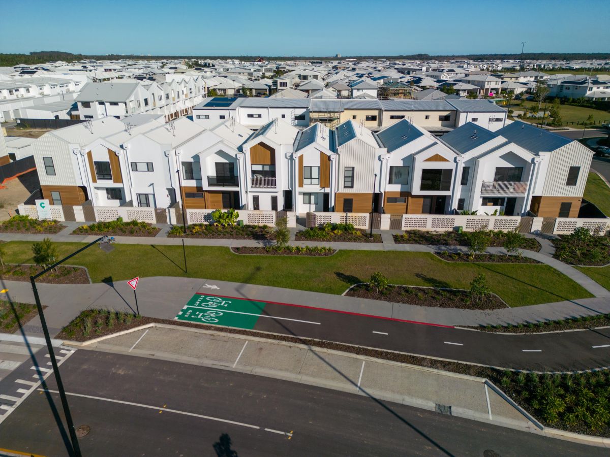 Aerial photo of cycleway infront of terrace homes