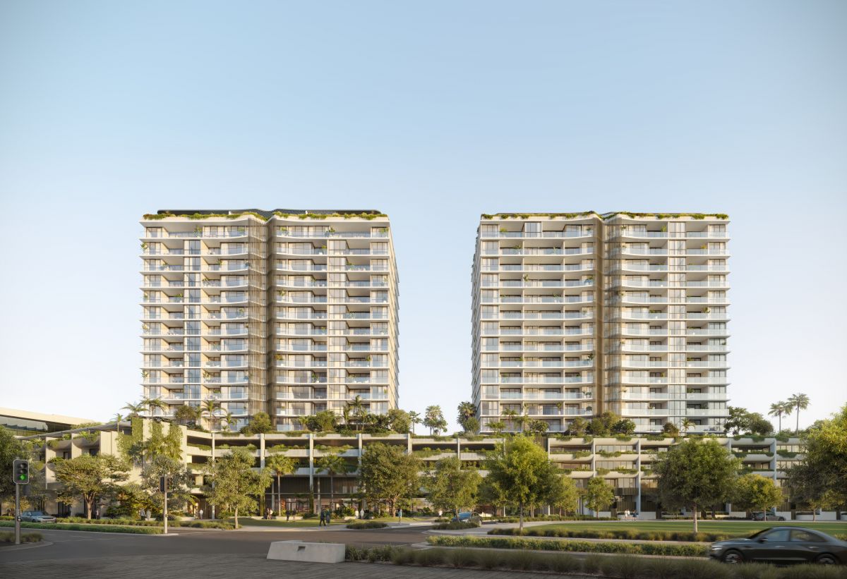 Artist impression of two residential towers with greenery at street level