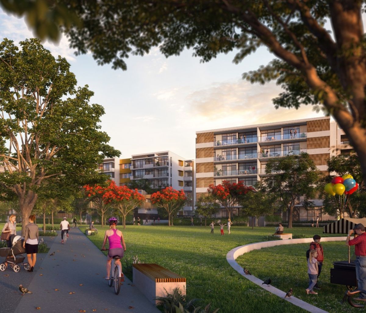 Artist impression of green space with residential buildings in background