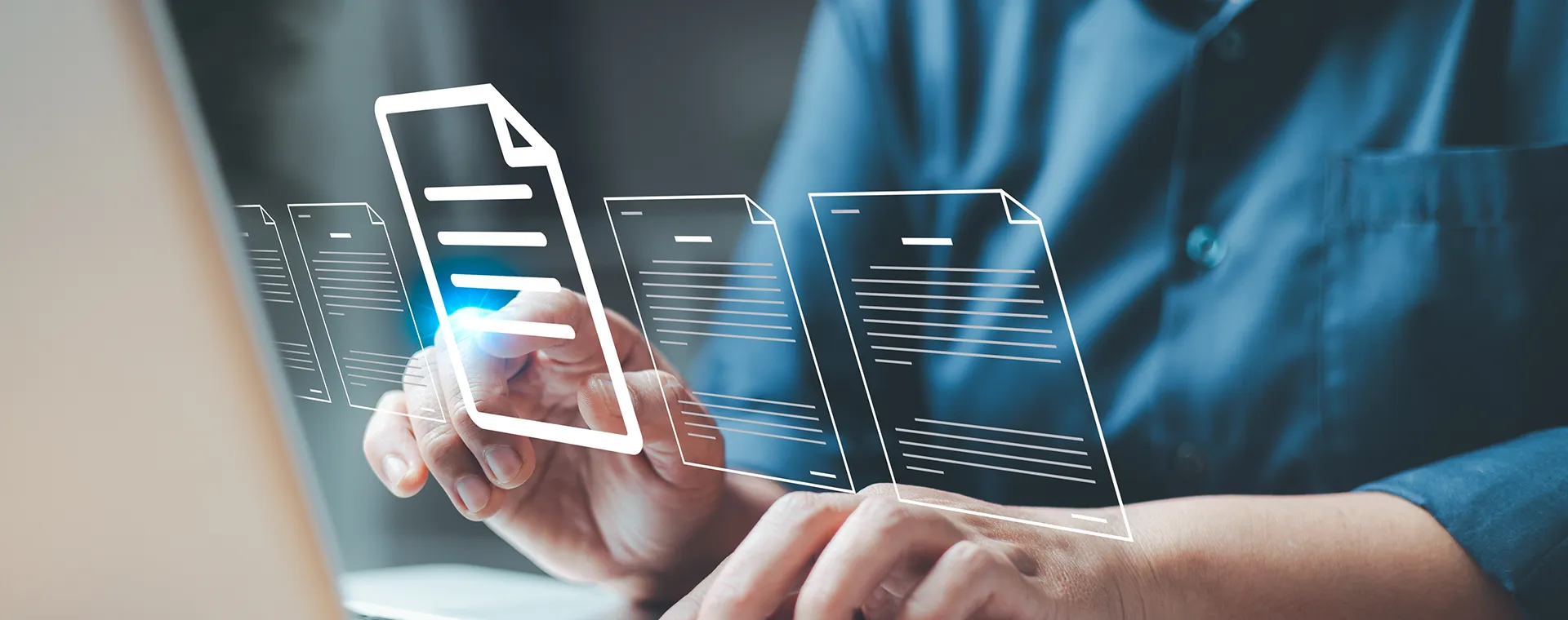 Hands interacting laptop digital icons of files