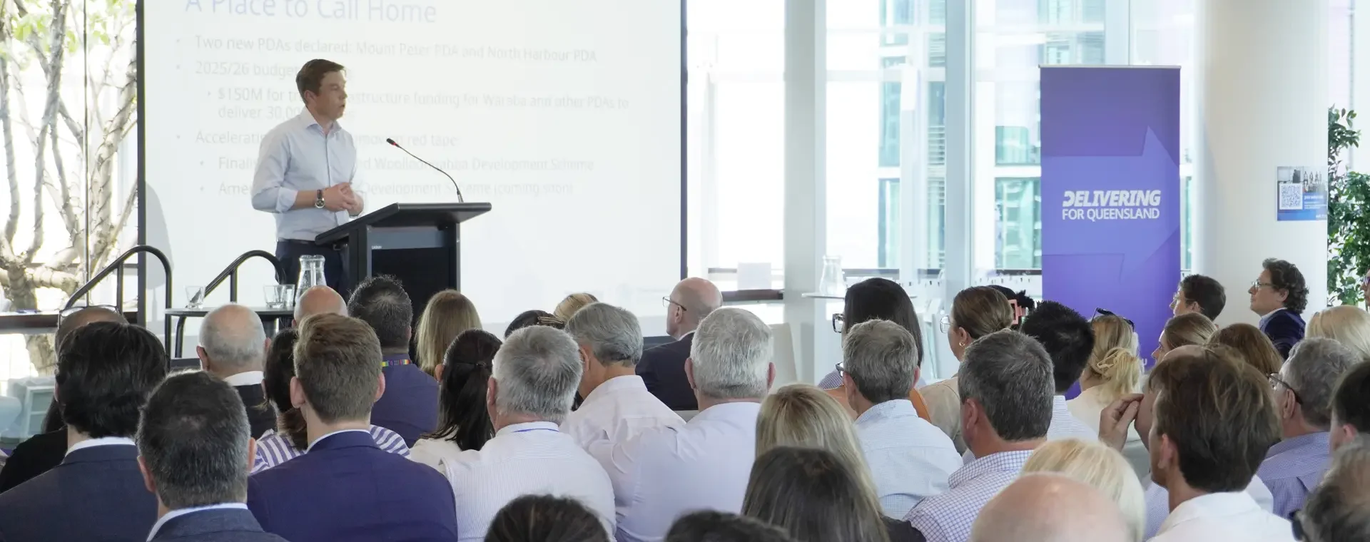 CEO presenting in front of an audience at the October 2025 EDQ Industry Forum