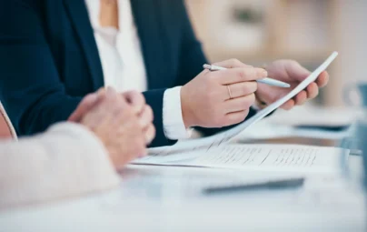 People meeting and interacting with a document