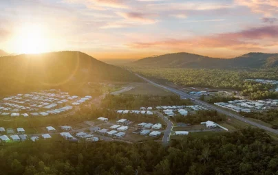 Aerial photo of a housing development in Townsville, with completed houses as well as houses under construction