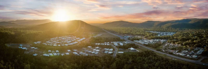 Aerial photo of a housing development in Townsville, with completed houses as well as houses under construction