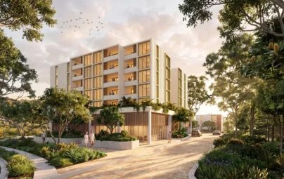 Artist's impression of a medium-density residential development at Varsity Lakes, featuring contemporary apartment buildings surrounded by landscaped greenery, shared open spaces and pedestrian walking paths that connect residents to outdoor recreational areas.